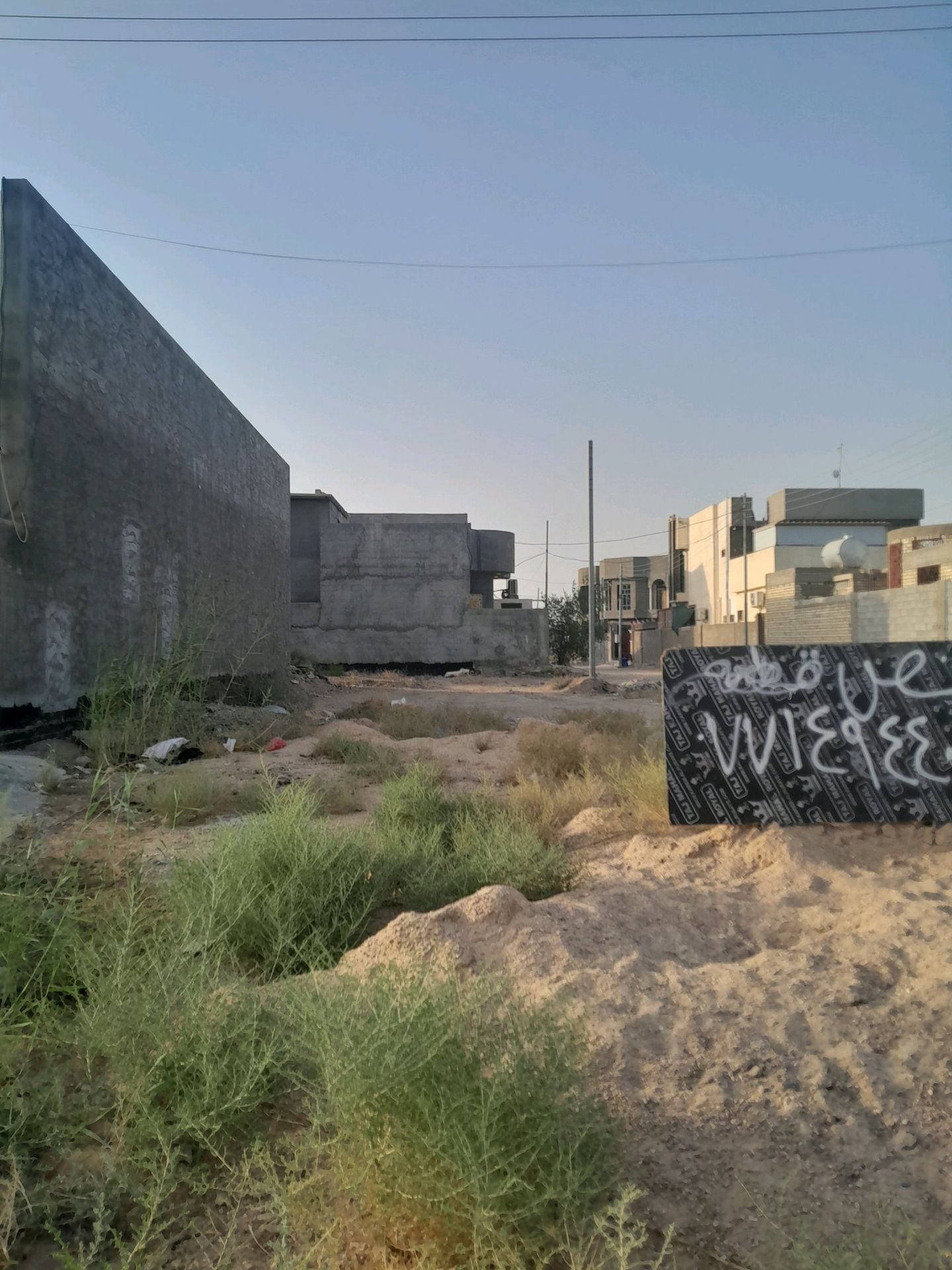 نصف قطعه ركن قرب الوقف السني (جامع ابو بكر الصديق ) ومجمع الاخاء السكني 